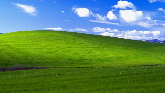 The provided JPEG showing the default Windows XP desktop wallpaper